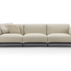 The Arflex Claudine L Sofa by Claesson Koivisto Rune is elegant, innovative with a hint of playfulness. Shown in beige fabric - Front View