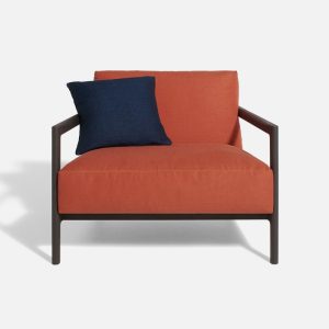 The Paul Smith designed Everyday Life Armchair for DePadova is the epitome of designer style and functionality. As a fashion designer, Paul Smith brings his sartorial expertise to the design of this armchair, with contrasting stitching that evokes the precision and attention to detail of haute couture. Shown here in a vibrant red - Front View